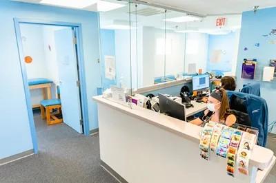 a front office with baby blue walls